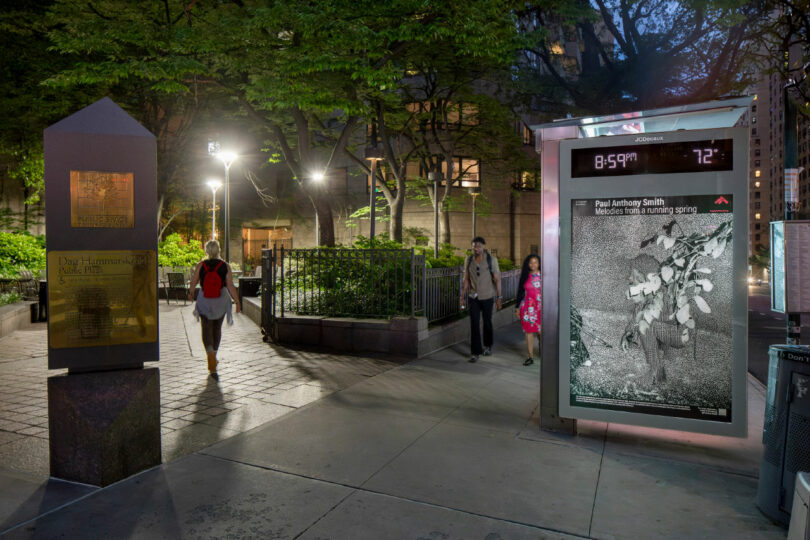 City park at night with artwork