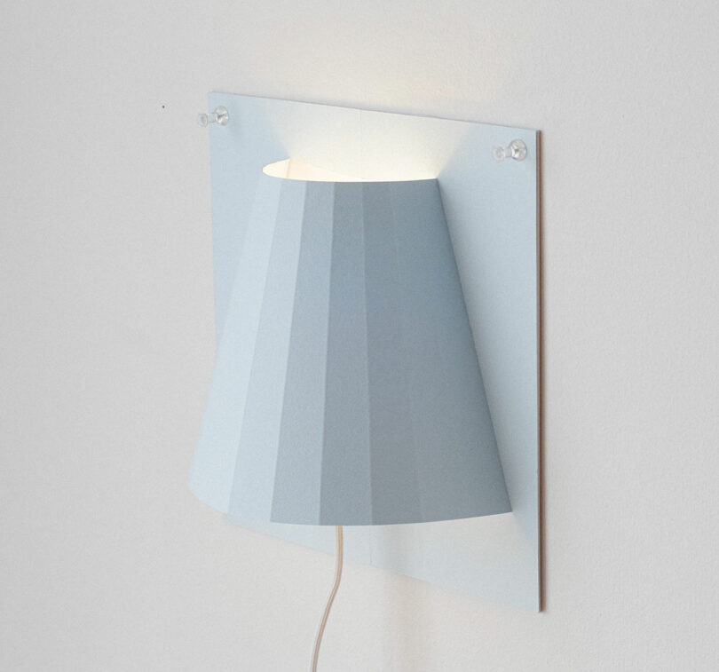 A Minimalist Paper Sconce That Hangs With Just Push-Pins