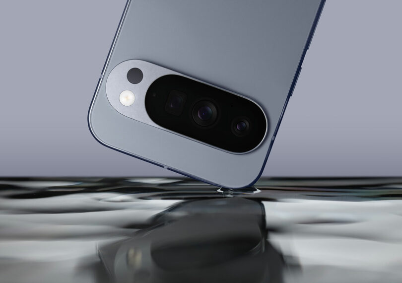 A smartphone with a dual-lens camera is shown partially submerged in water, emphasizing its water-resistant feature.