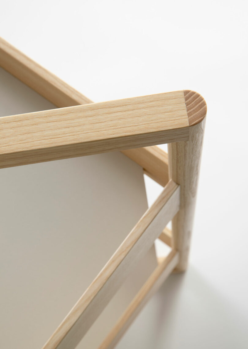 Close-up of a light wood rectangular frame with clean joints and white panel inserts, photographed on a white background.