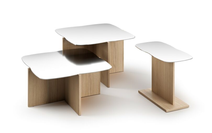 Three modern side tables with wooden bases and flat, reflective metal tops are displayed against a white background
