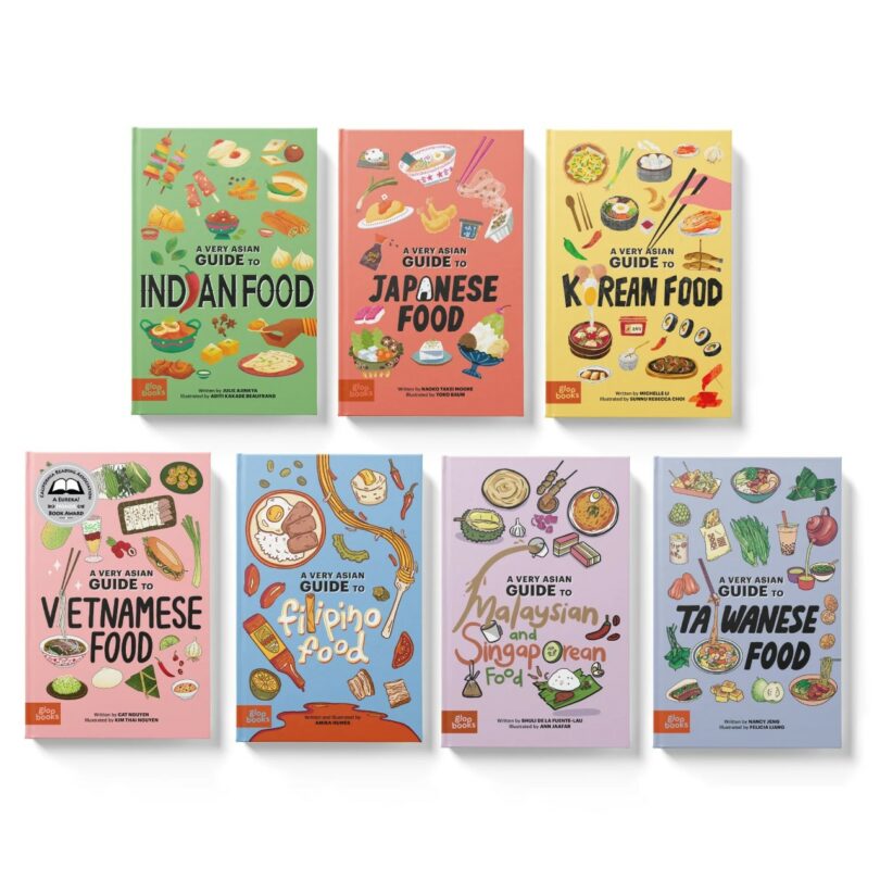 Seven colorful illustrated cookbook covers titled "A Very Asian Guide To..." featuring Indian, Japanese, Korean, Vietnamese, Filipino, Malaysian and Singaporean, and Taiwanese food