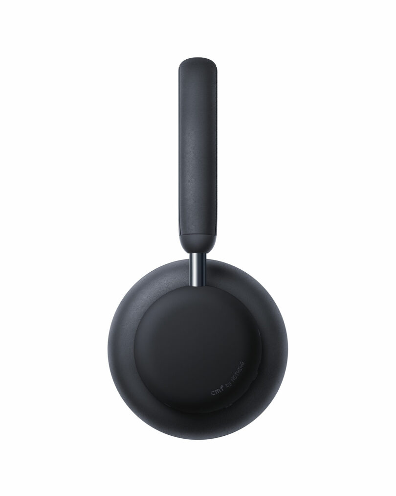 Black wireless over-ear headphone shown from the side against a white background.