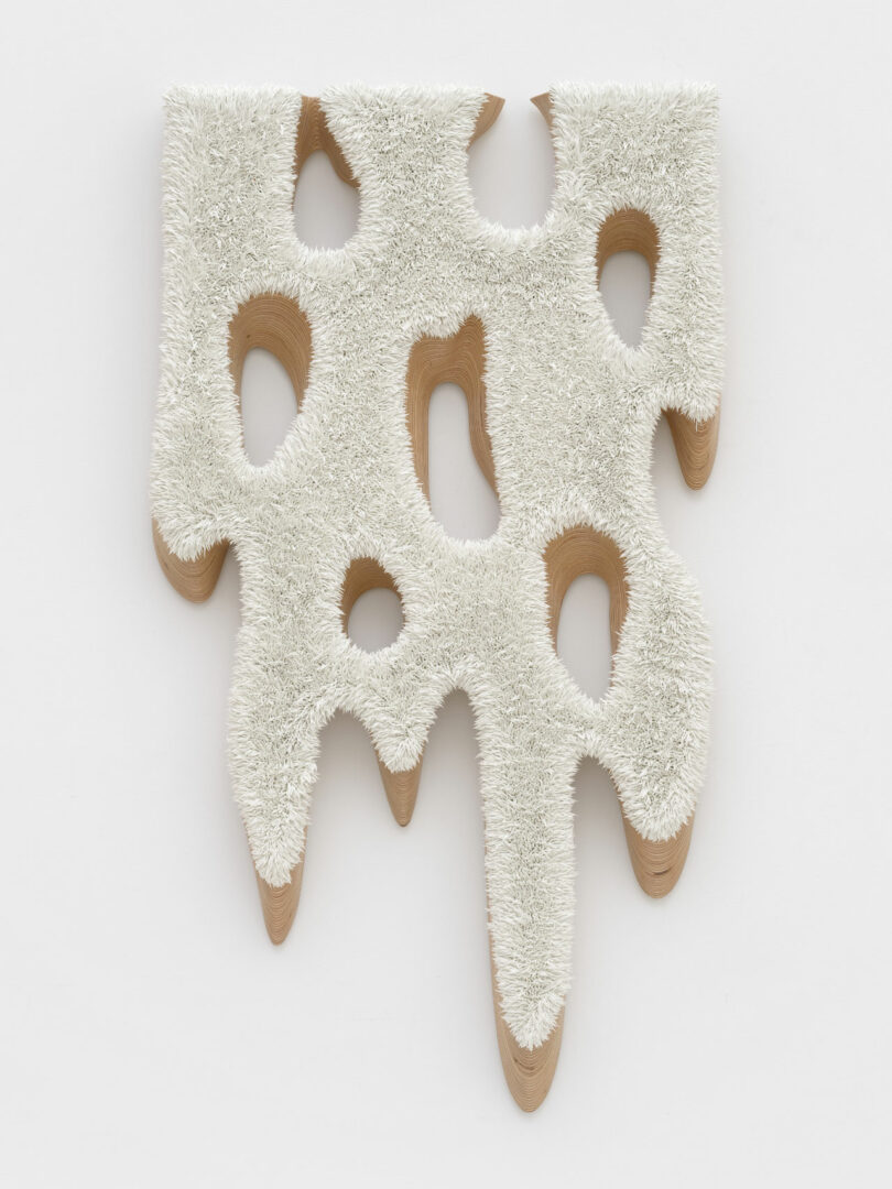 White painting on carved support resembling melting snow