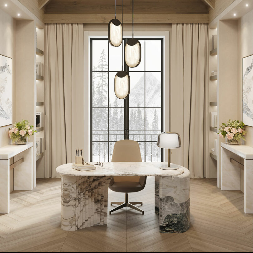 Modern home office with a marble desk, beige swivel chair, pendant lights, large window showing snowy mountains, neutral decor, and flowers on side tables.