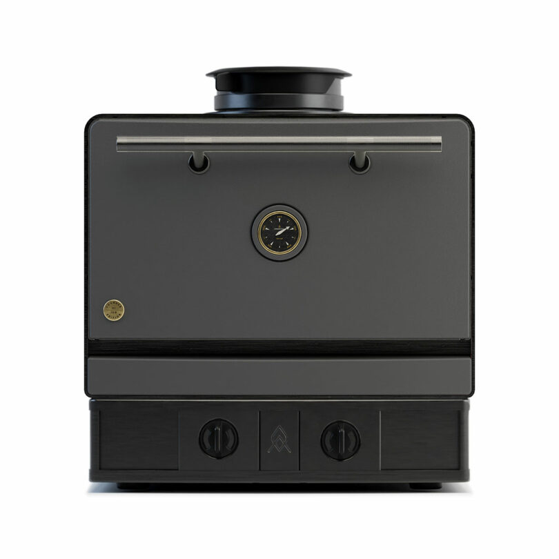 Front view of a modern, black and gray Emberhaus oven with a central temperature gauge, metallic bar handle, and two control knobs at the bottom.