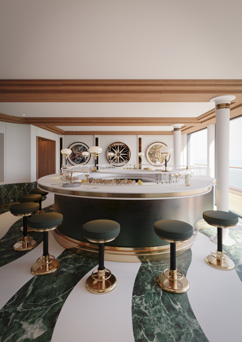 Elegant bar area with green stools, marble flooring, a curved counter, and large decorative wall pieces behind the bar. Floor-to-ceiling windows reveal an ocean view on the right.