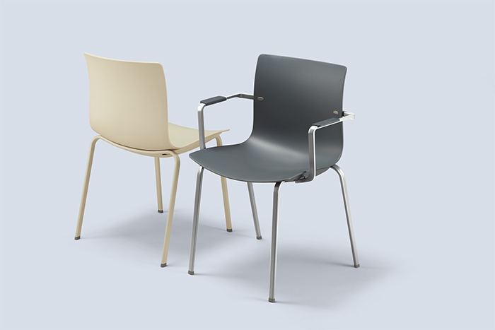 Two modern chairs are shown, one beige without armrests and one dark gray with metal armrests and legs, both on a light grey background.