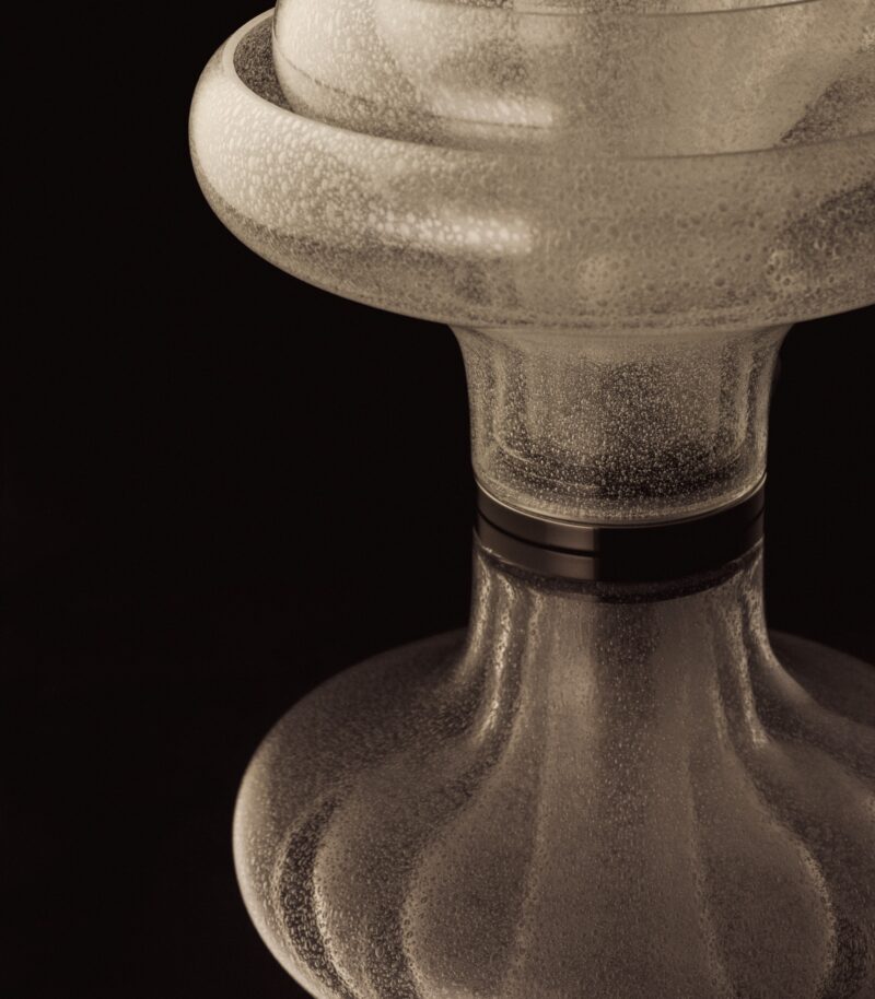 A textured, clear glass hookah base with a wide bowl and ribbed neck.